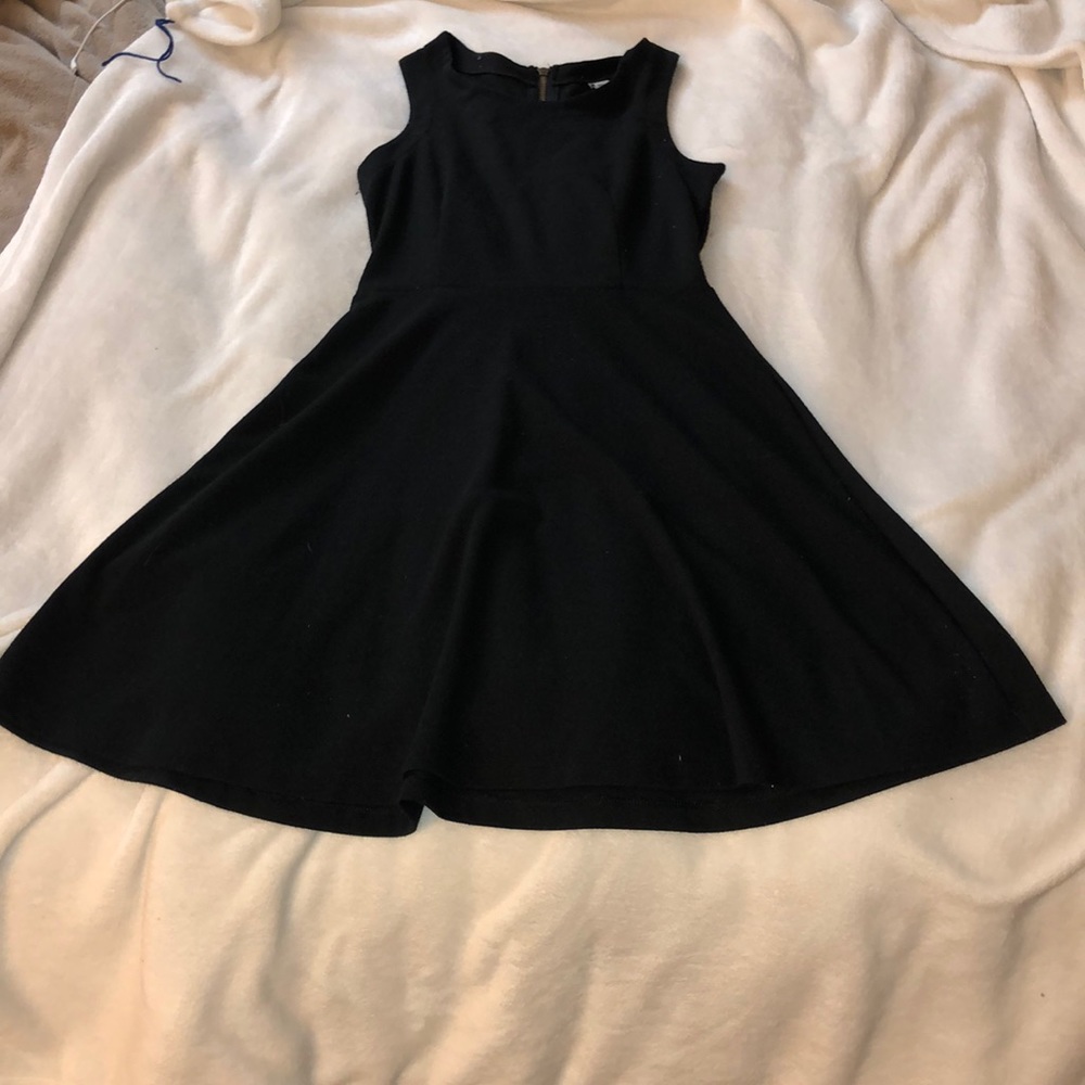 black skater dress with a cinched waist